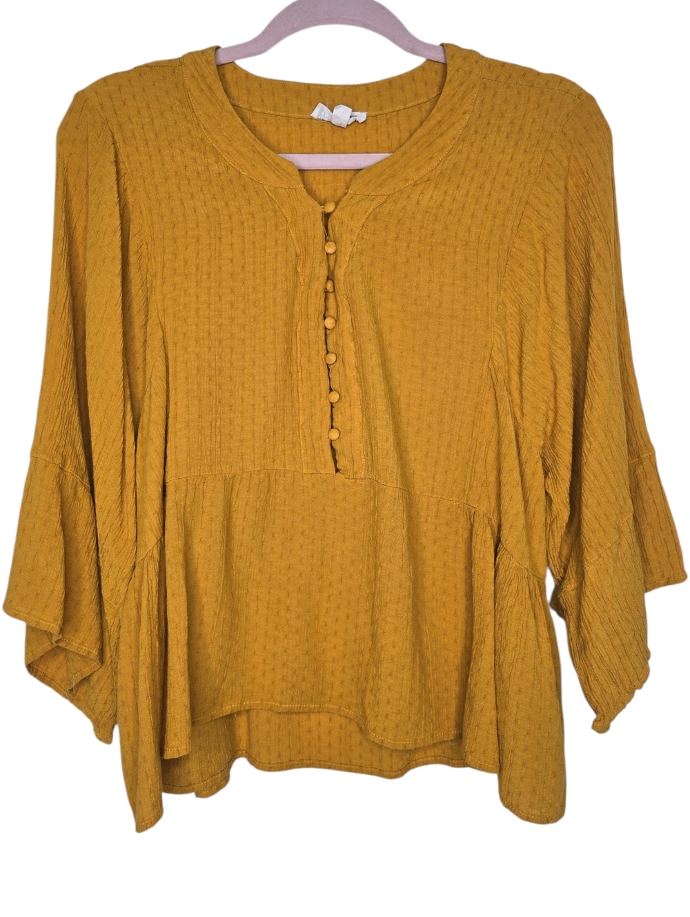 Grand & Greene mustard-colored long-sleeve blouse